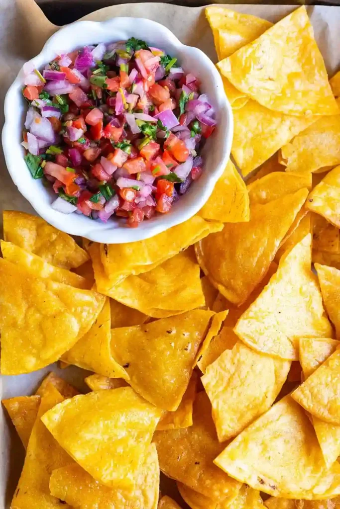 Tostada Chips served with fresh pico de gallo salsa.
