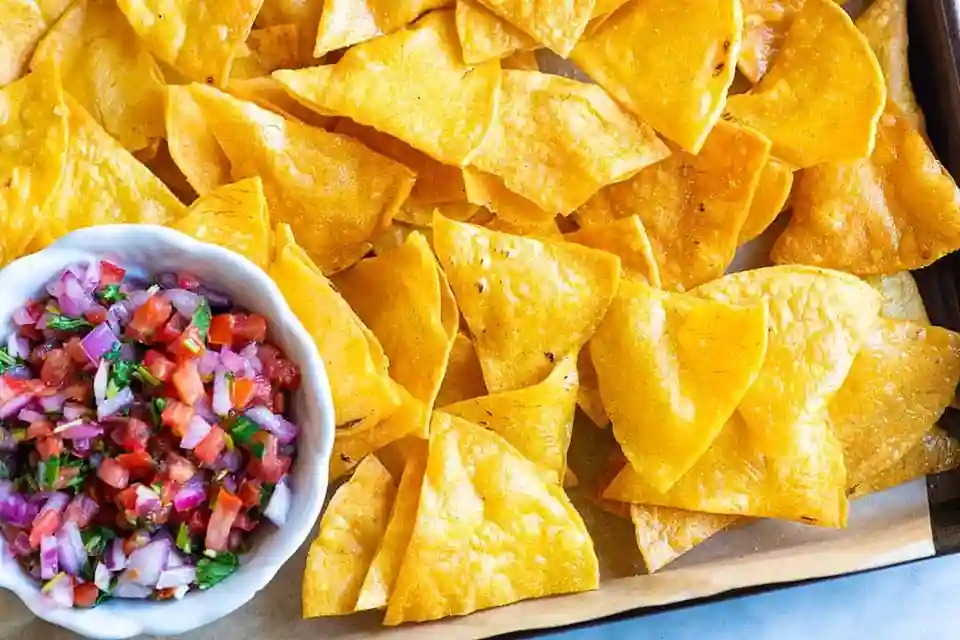 Tostada Chips served with fresh pico de gallo salsa.