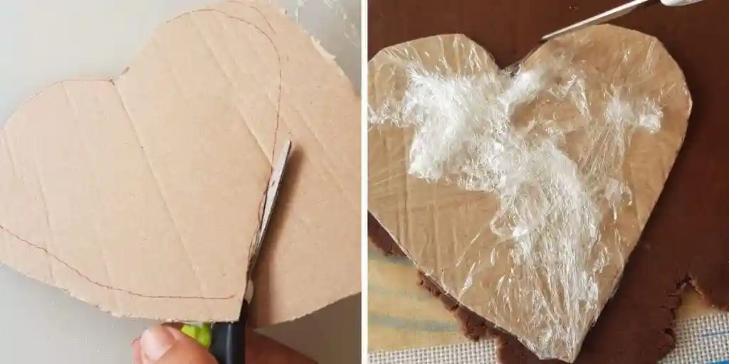 Lebkuchenherz Schablone aus Karton ausschneiden und mit Frischhaltefolie überziehen – einfache Herzform Vorlage zum Lebkuchenherz selber machen.