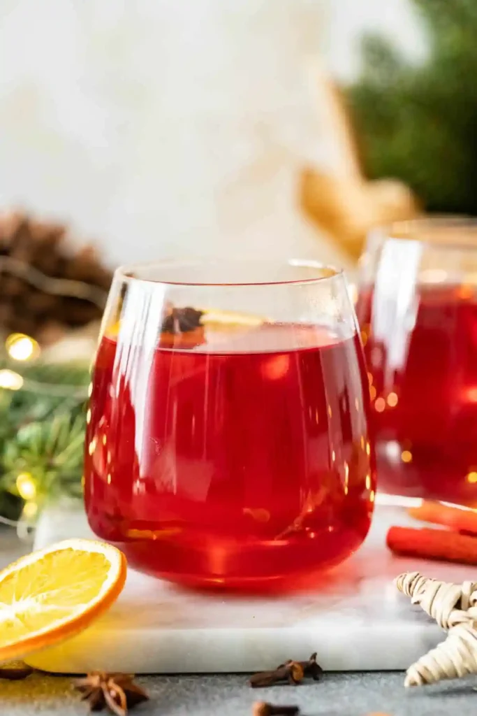 Kinderpunsch Rezept – alkoholfreier Punsch selber machen mit Orange, Gewürzen und Tee im Glas