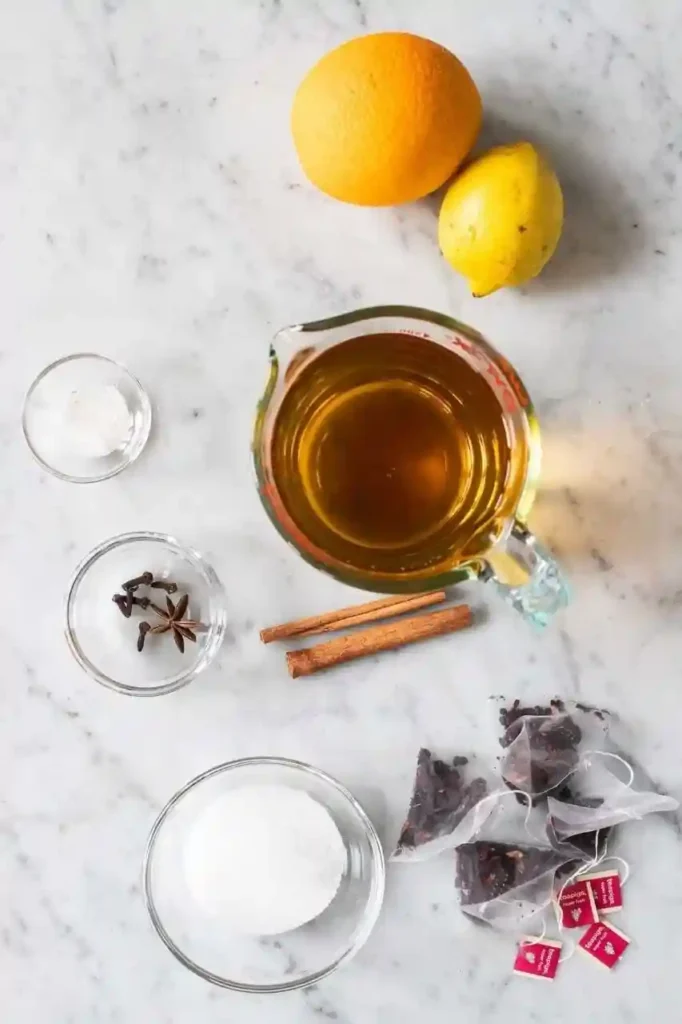 Kinderpunsch Rezept Zutaten – alkoholfreier Punsch selber machen mit Tee, Apfelsaft, Orange, Zitrone und winterlichen Gewürzen