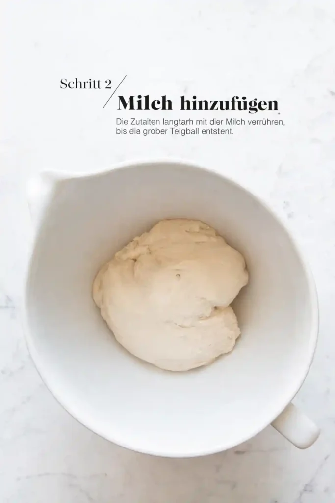 Milch zum Hefeteig für Osterhasen hinzufügen – Schritt beim Osterhasen backen aus Hefeteig