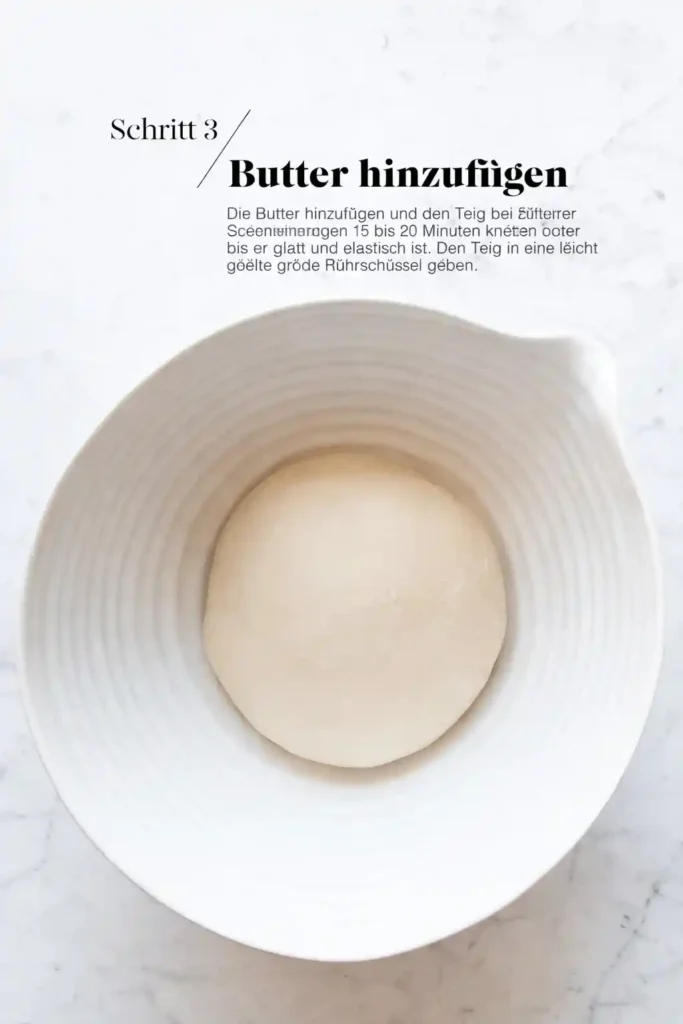 Butter zum Hefeteig hinzufügen – Schritt beim Osterhasen backen aus Hefeteig für fluffige Hefehasen