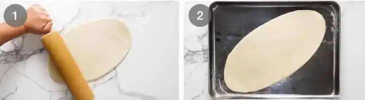Pide-Teig mit einem Nudelholz oval ausrollen und auf ein vorbereitetes Backblech legen.